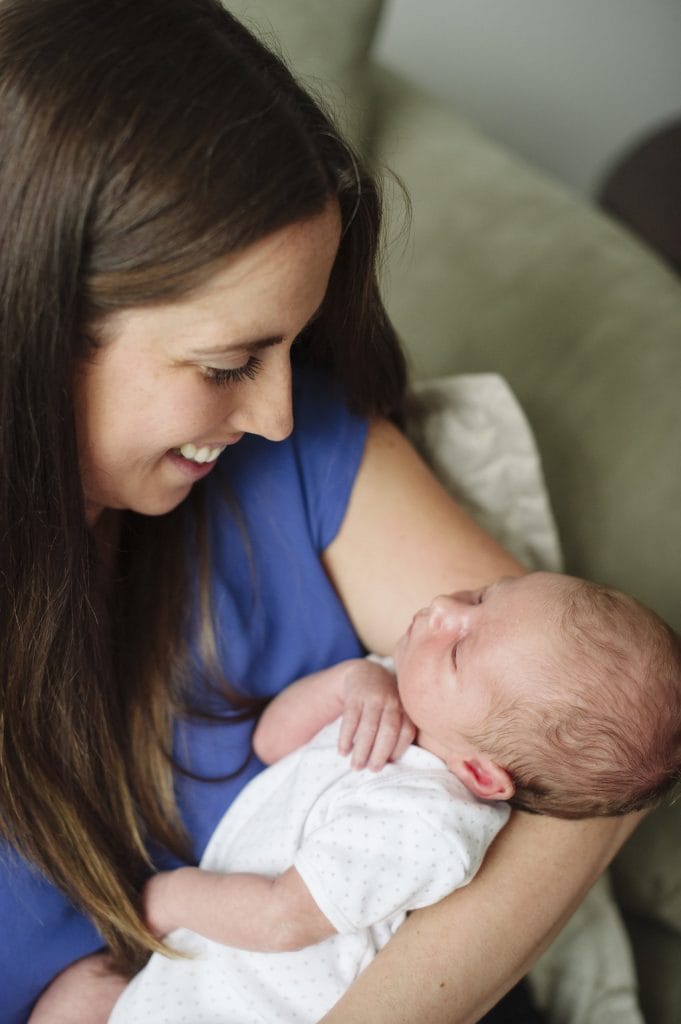 mother holding her newborn baby