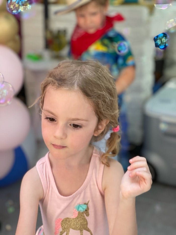 little girl with balloons
